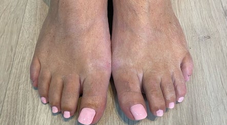 Fresh pink toenail polish at Bethevansbeauty, Exeter, England, GB, showcasing a chic pedicure style.