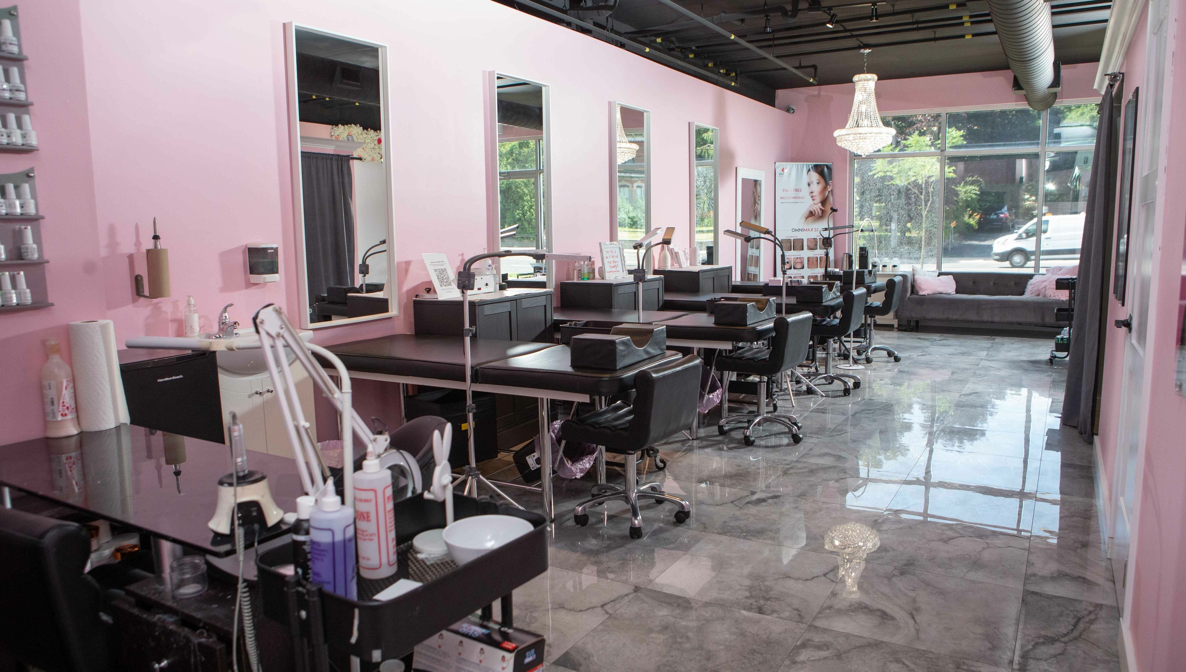 Elva Medical Aesthetics, Stoney Creek interior with pink walls and beauty stations in Hamilton, Ontario, CA.