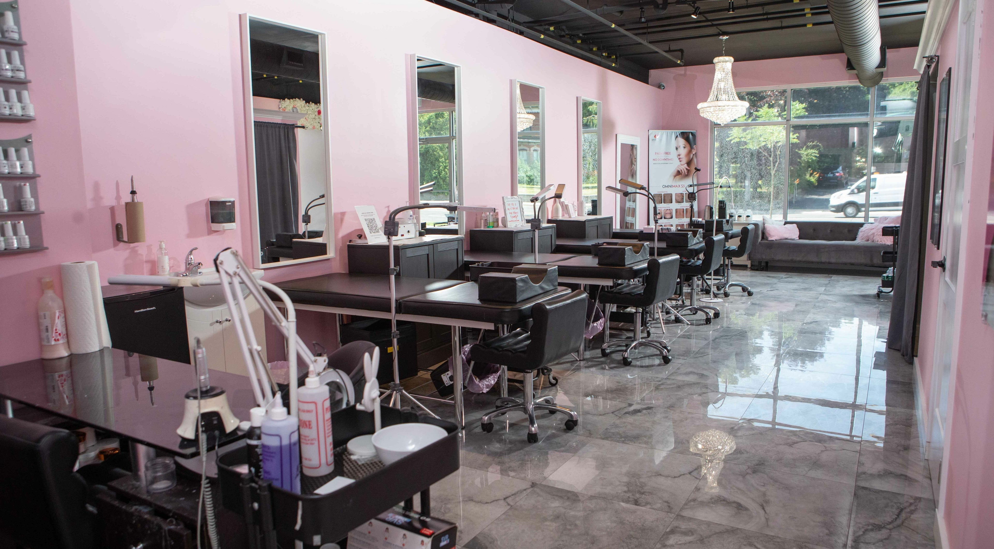 Elva Medical Aesthetics, Stoney Creek interior with pink walls and beauty stations in Hamilton, Ontario, CA.