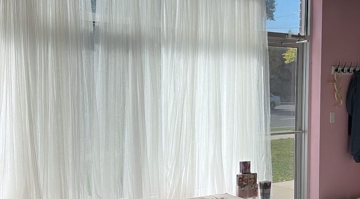 Bright window with sheer curtains at Elva Medical Aesthetics, Caledonia, Ontario, CA.