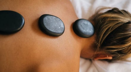 Relaxing hot stone massage at Beauty Home Spa in Saskatoon, Saskatchewan, CA, exclusively for ladies.