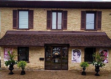 Front view of Painted Hair Studio in Kitchener, Ontario, CA with welcoming entrance and stylish facade.