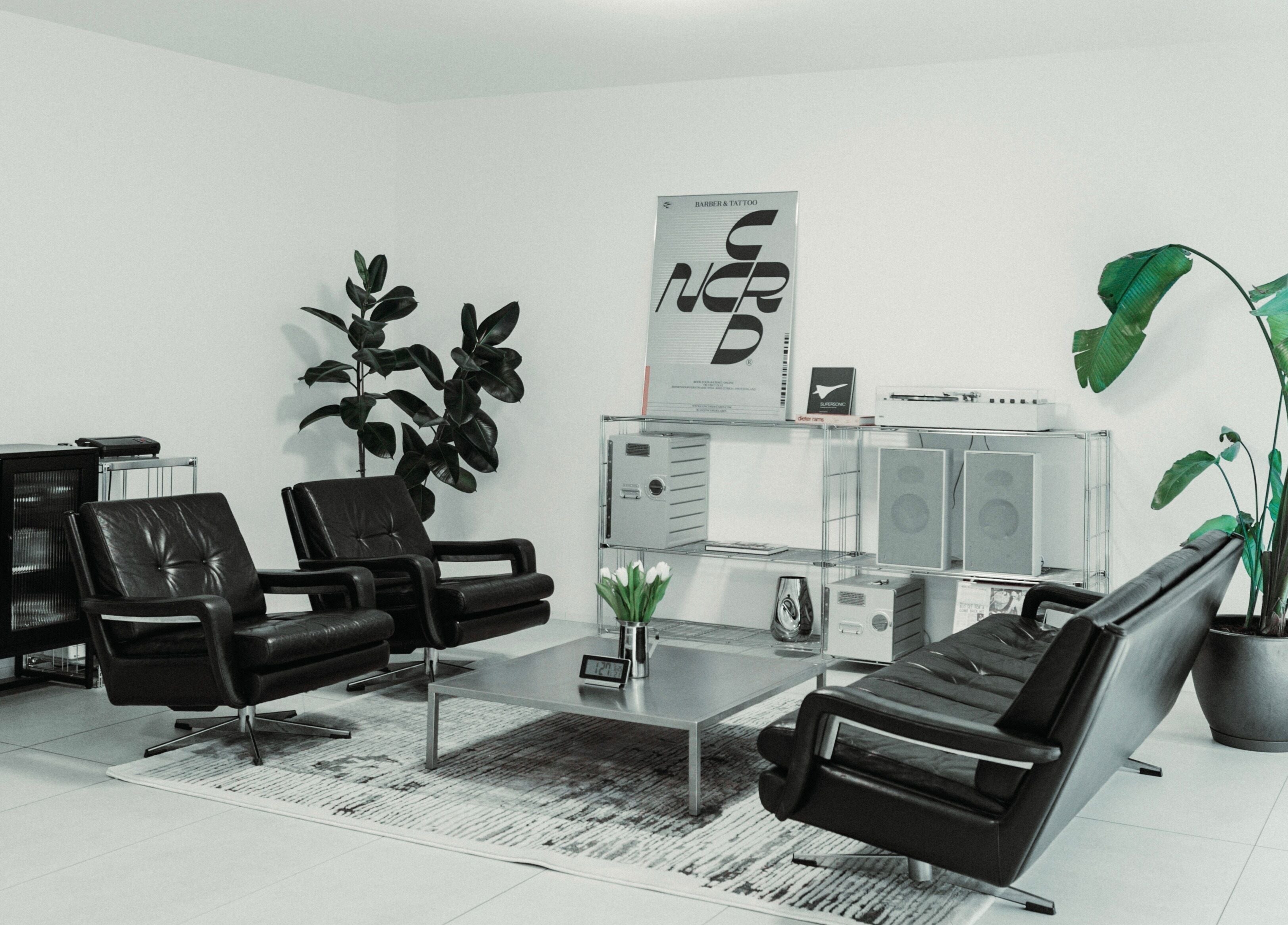 Stylish lounge area at CONCORDE, Zürich, Zürich, CH with leather chairs and modern decor.