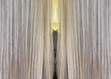 Shiny, straightened hair at FNBC Salon, Leicester, England, GB, showcasing expert styling.