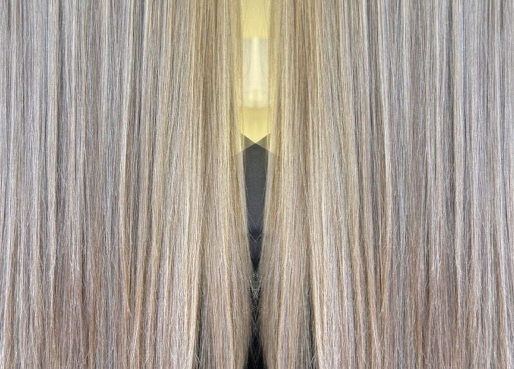Shiny, straightened hair at FNBC Salon, Leicester, England, GB, showcasing expert styling.
