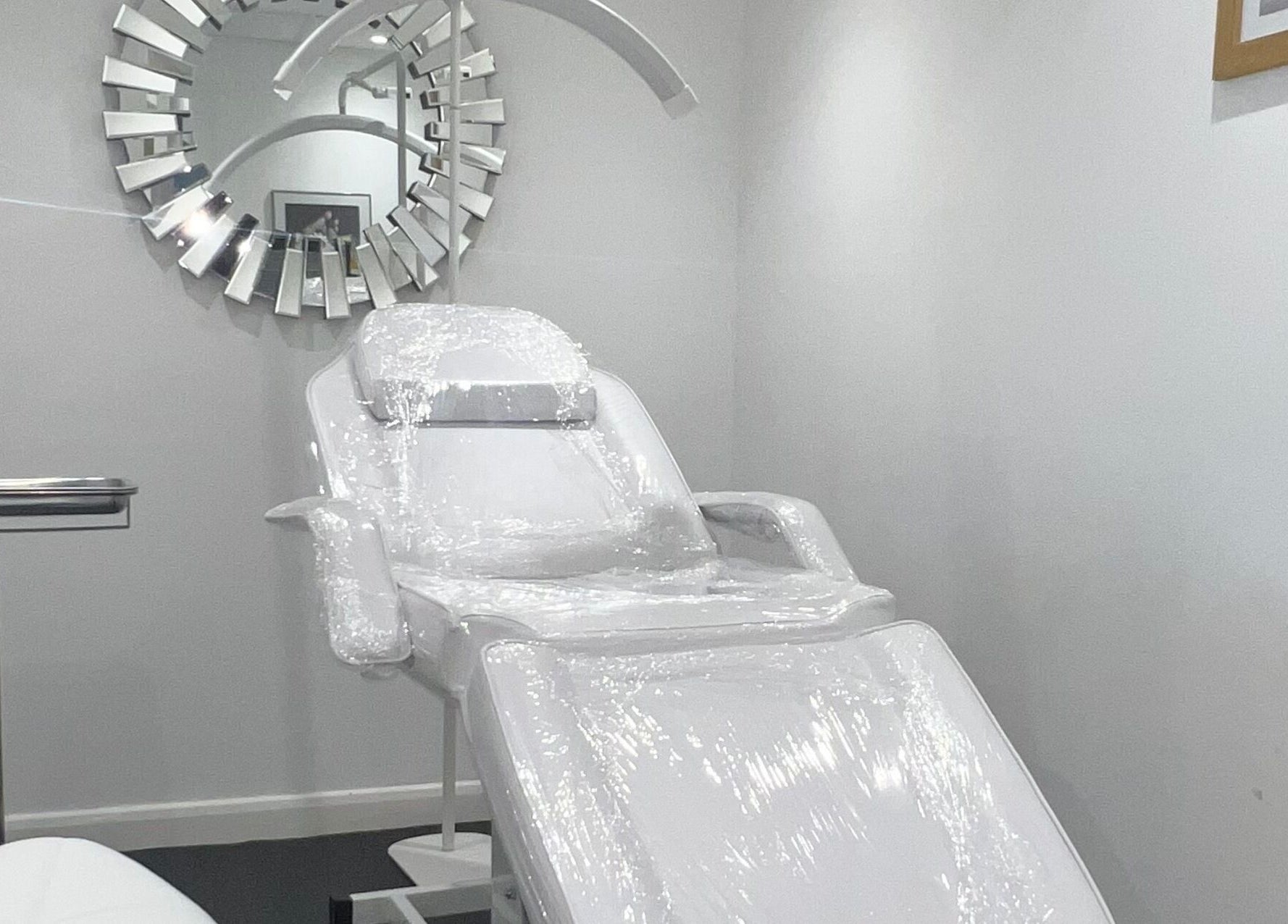 Modern treatment chair at La Bella Aesthetic Clinic, Salford, England, GB, reflecting style and comfort.