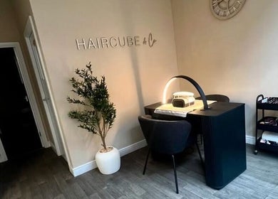 Modern salon setup at DermaLush Aesthetics, Normanton, England, GB with stylish furniture and decor.