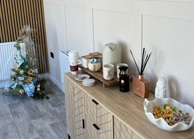 Elegant refreshment setup at DermaLush Aesthetics, Normanton, England, GB, featuring tea and décor.