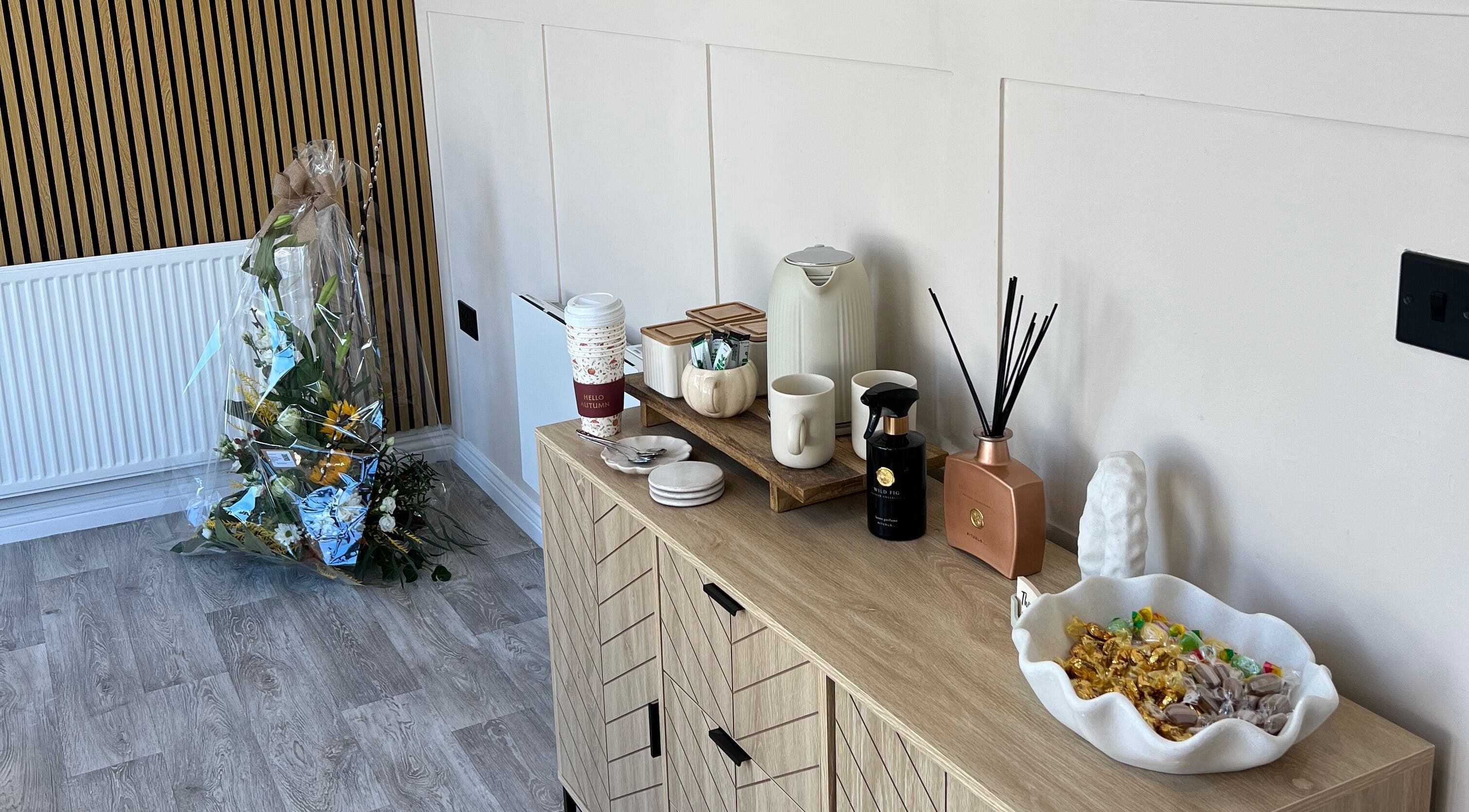 Elegant refreshment setup at DermaLush Aesthetics, Normanton, England, GB, featuring tea and décor.