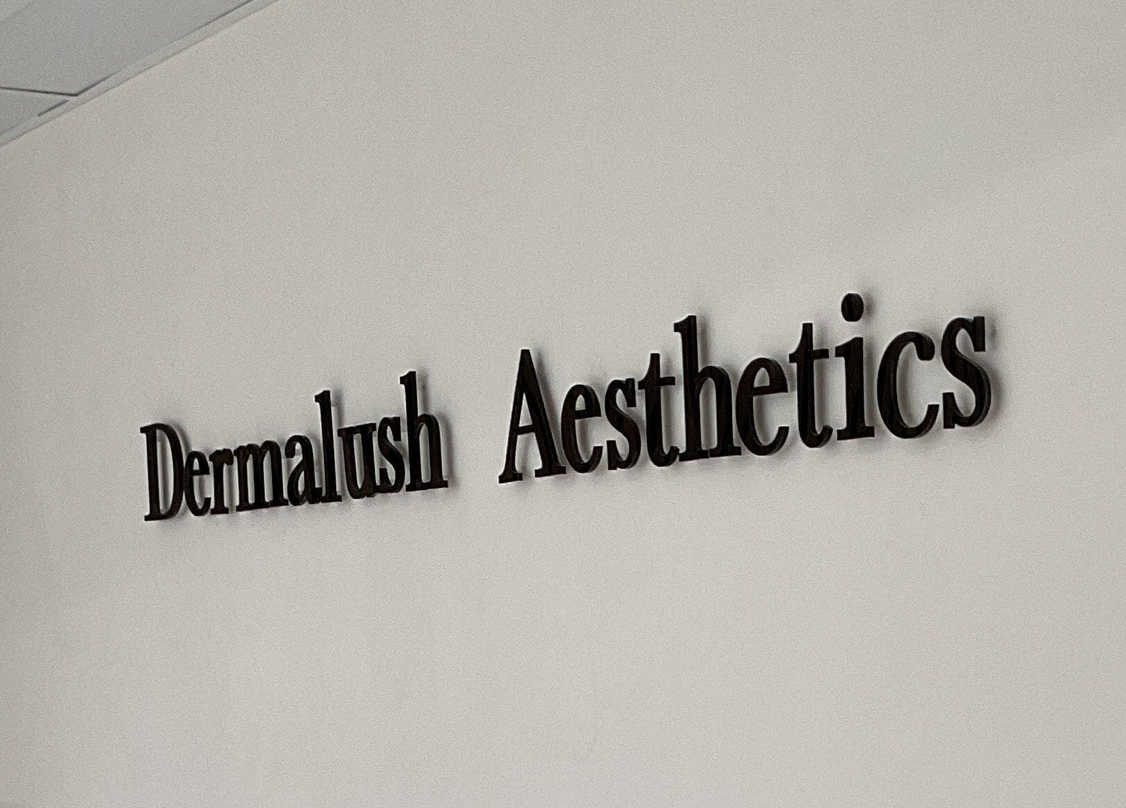 DermaLush Aesthetics signage on wall, Normanton, England, GB. Modern and stylish decor.