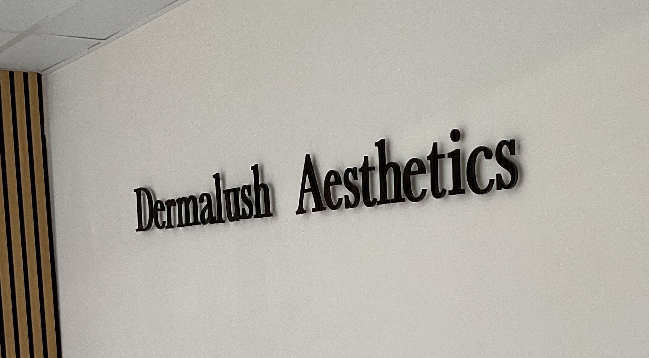 DermaLush Aesthetics signage on wall, Normanton, England, GB. Modern and stylish decor.