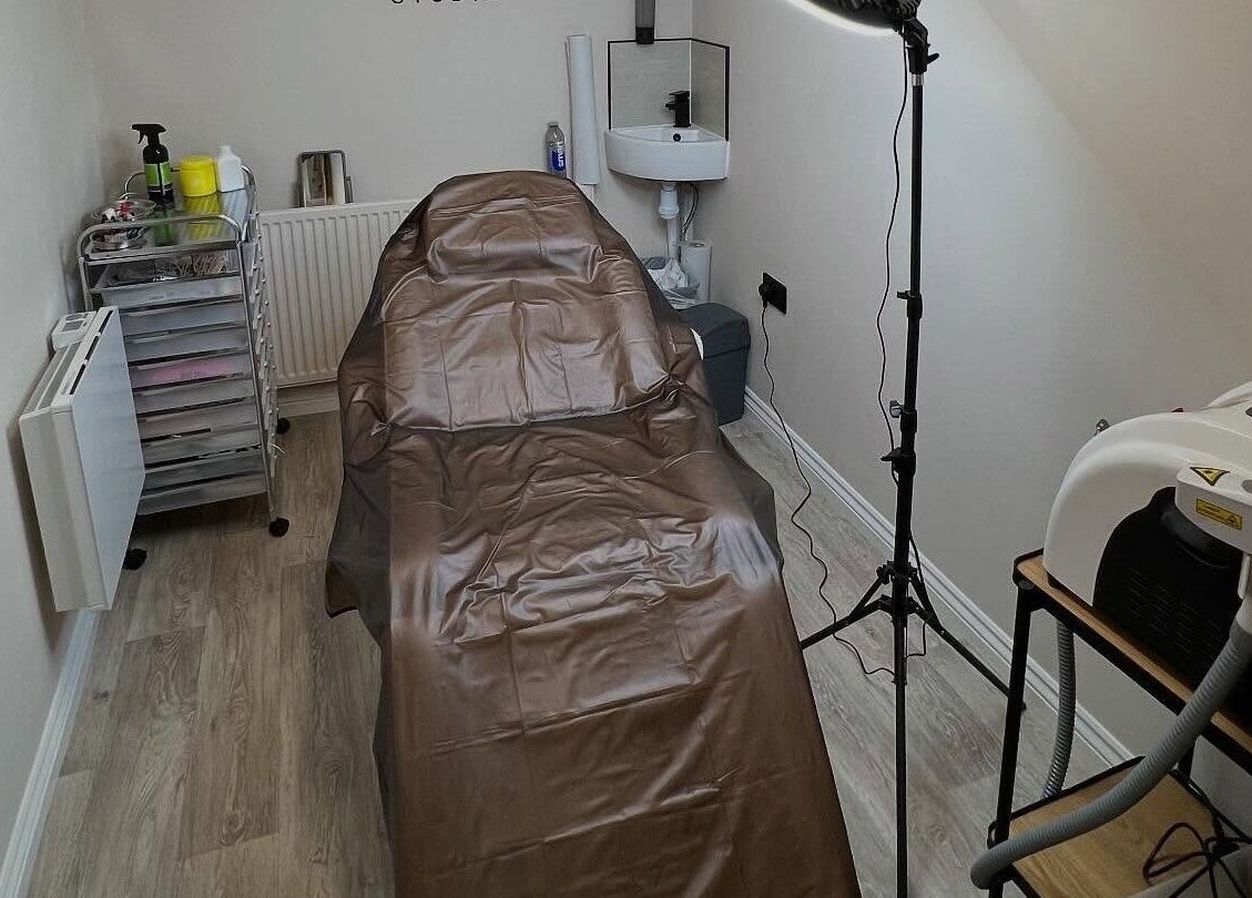 Cozy treatment room at DermaLush Aesthetics in Normanton, England, GB, equipped for professional wellness services.