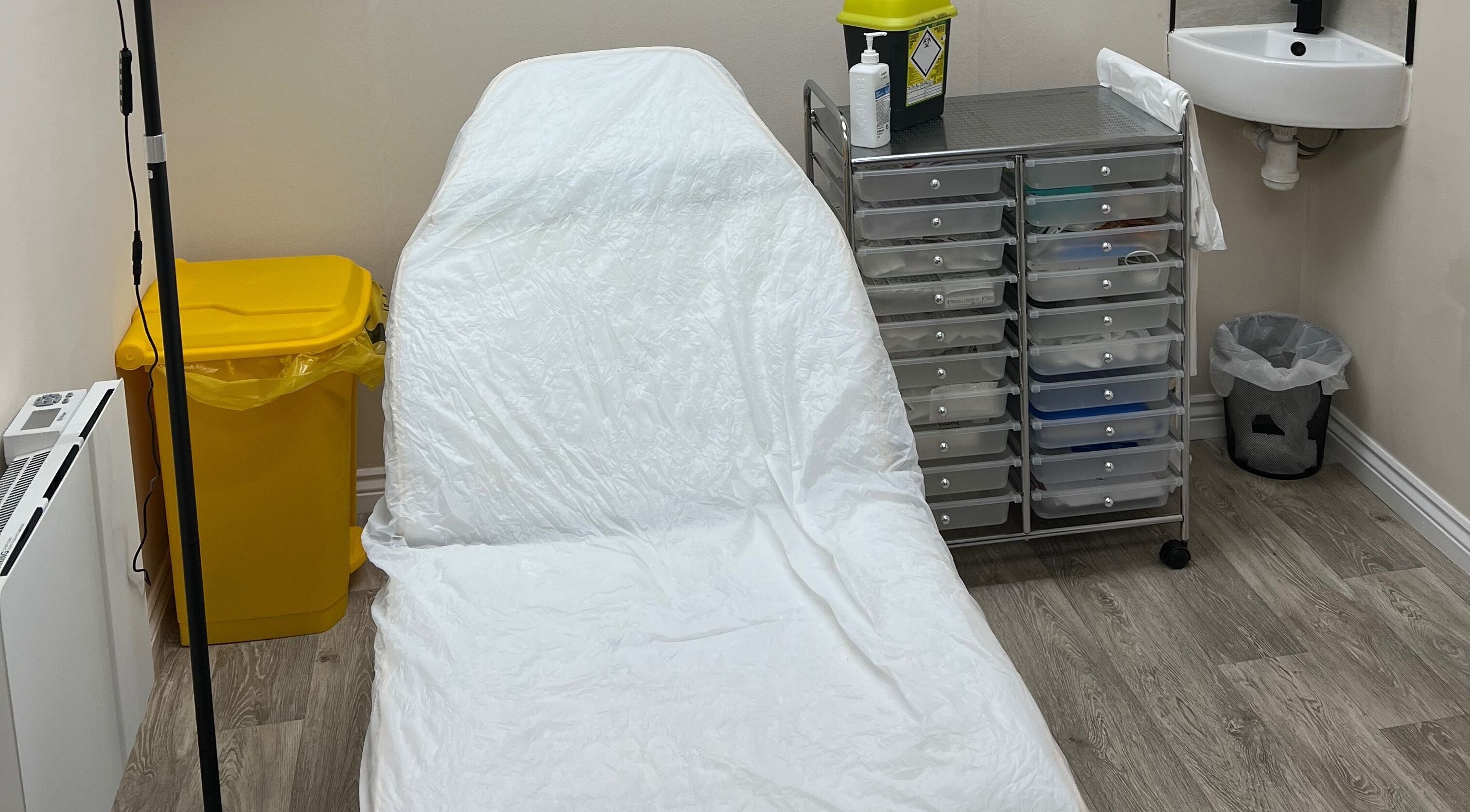 Treatment room at DermaLush Aesthetics in Normanton, England, GB featuring a clean, professional setup.