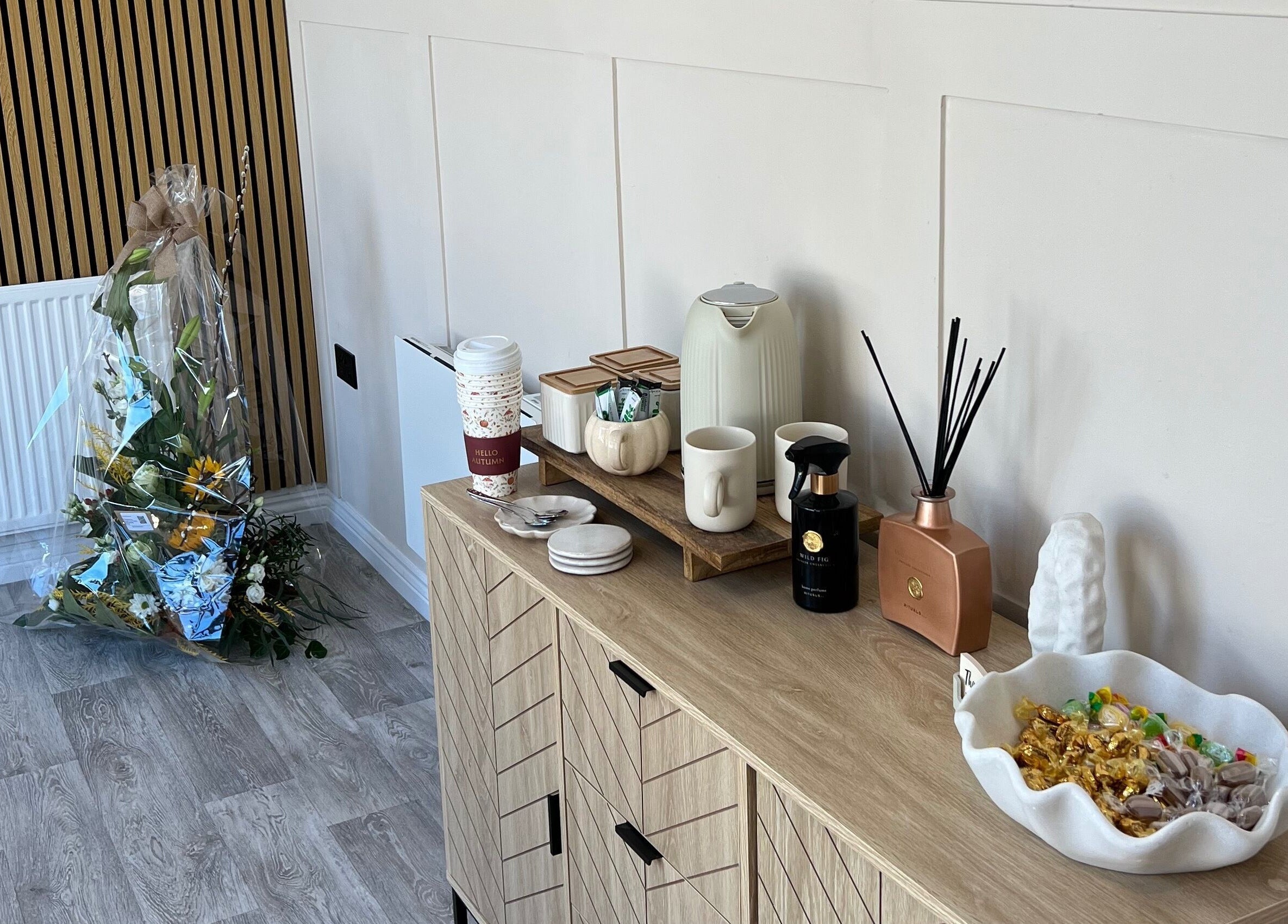 DermaLush Aesthetics in Normanton, England, GB features a stylish refreshment corner with snacks and beverages.
