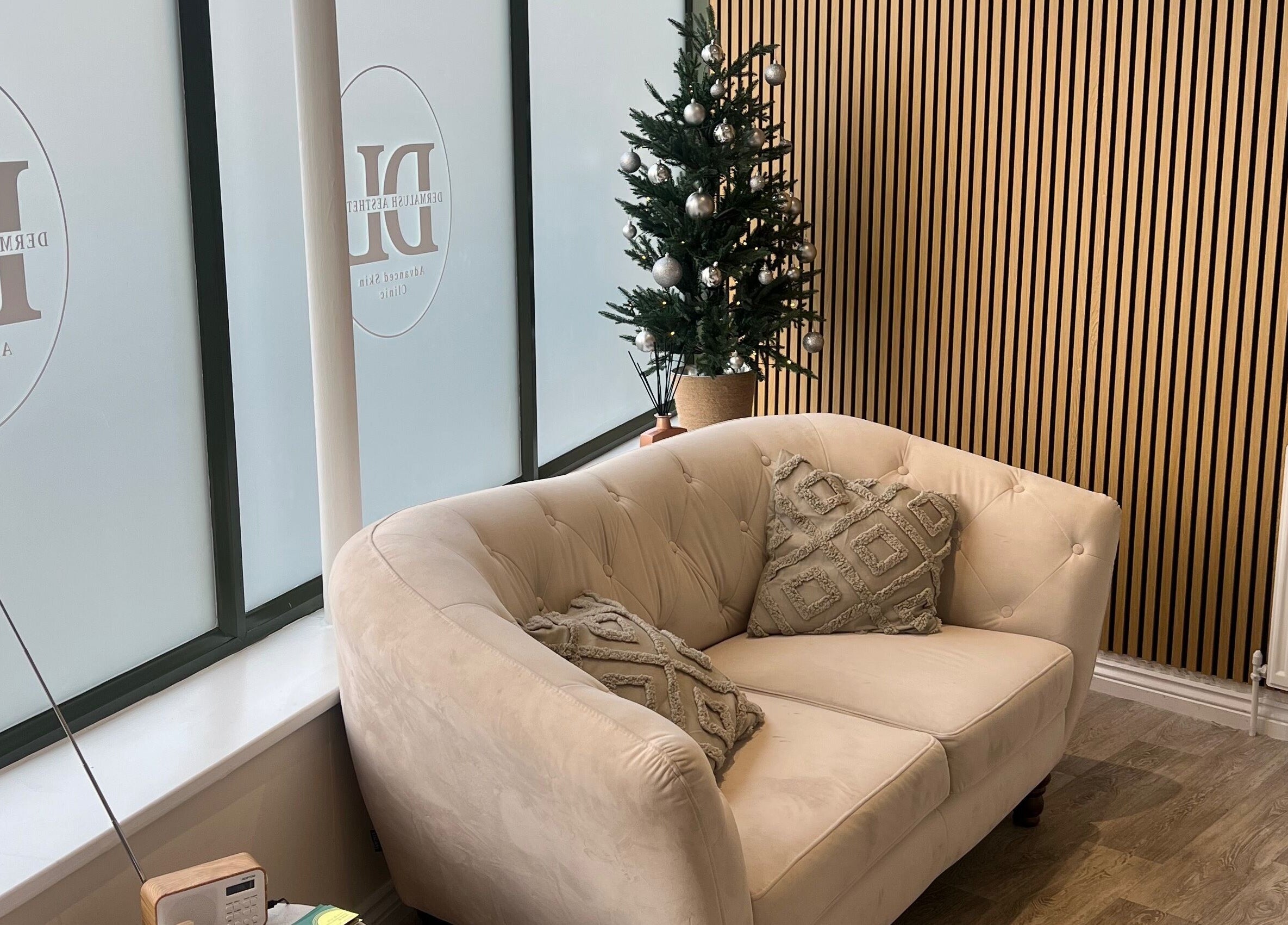 Inviting seating area at DermaLush Aesthetics, Normanton, England, GB with elegant decor.