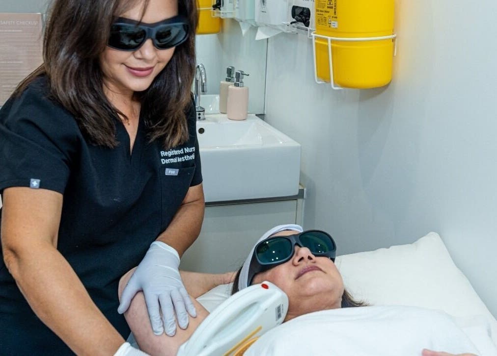 Aesthetician performing laser treatment at Aesthetics and Co., Melbourne, Victoria, AU.