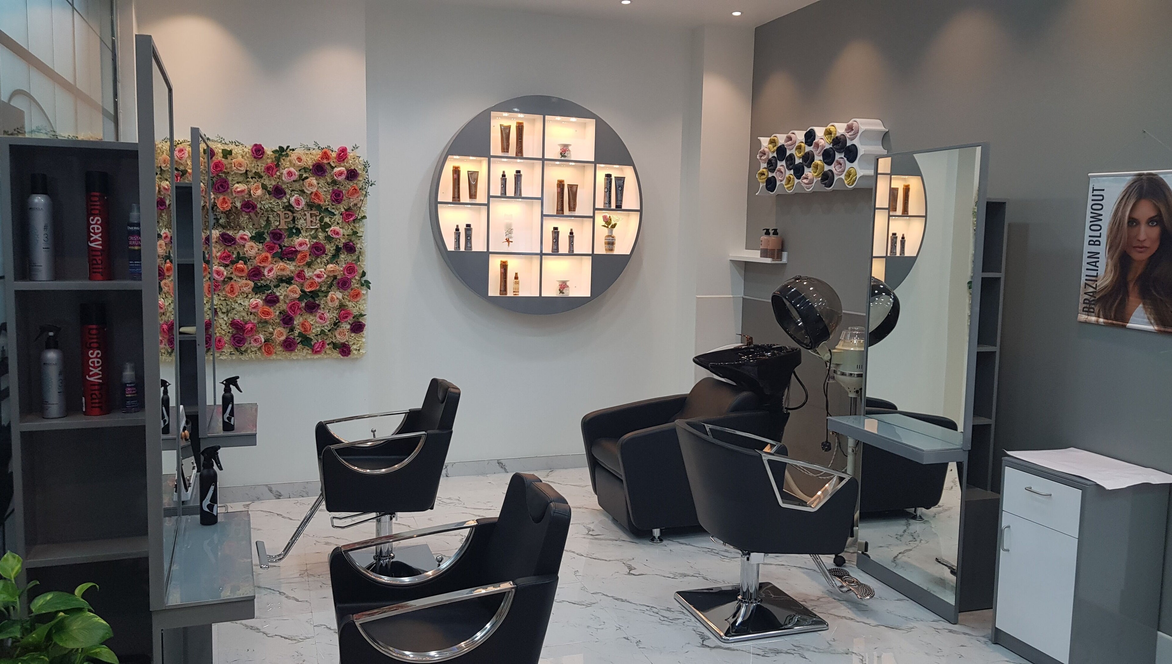 Elegant interior of Hype Ladies Salon - Al Nahda Branch in Al Nahda, Dubai, AE with stylish chairs and decor.