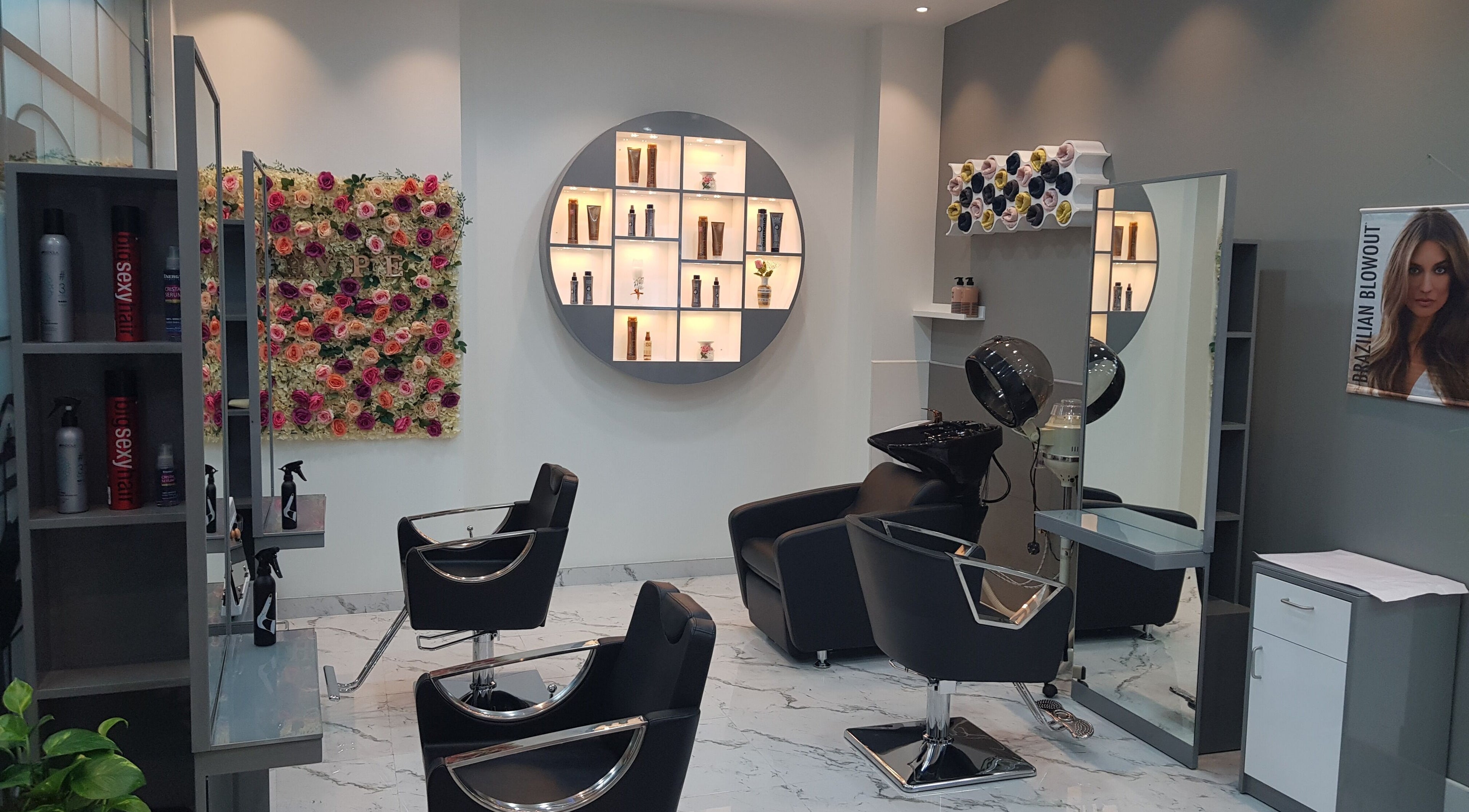 Elegant interior of Hype Ladies Salon - Al Nahda Branch in Al Nahda, Dubai, AE with stylish chairs and decor.