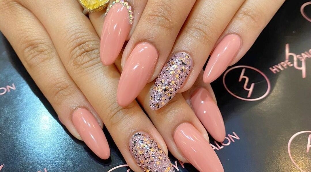 Elegant pink manicure with glitter at Hype Ladies Salon - Al Nahda Branch, Al Nahda, Dubai, AE.