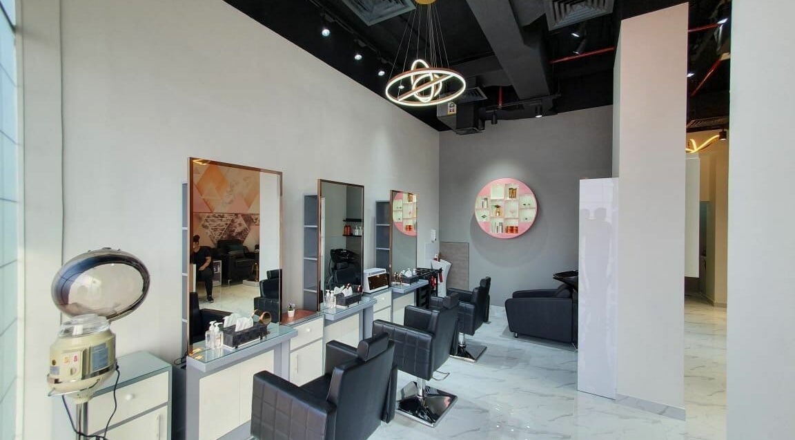 Modern salon interior at Hype Ladies Salon - Majan Branch, Dubai, AE, featuring sleek styling stations.