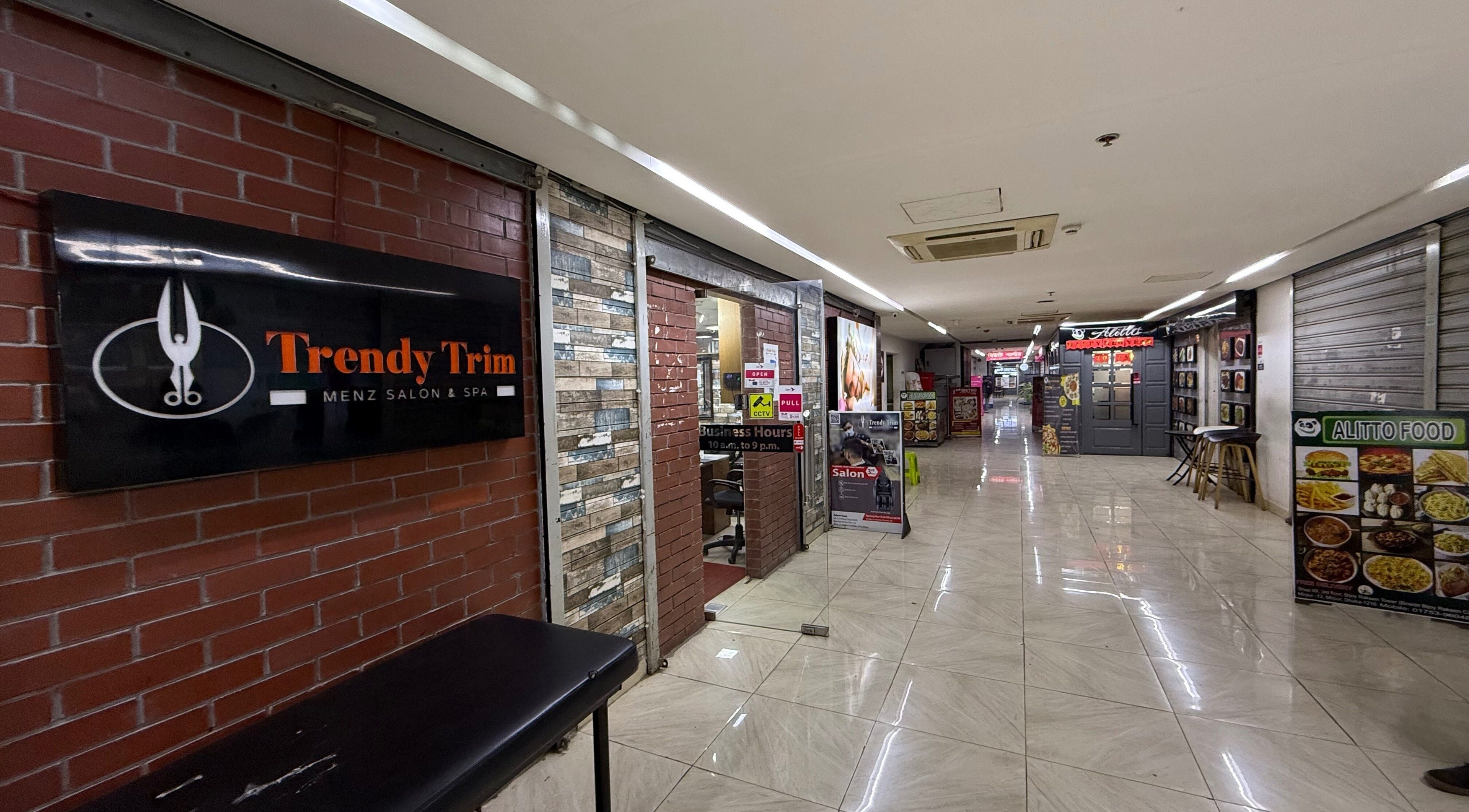 Entrance of Trendy Trim salon showcasing signage in Dhaka, Dhaka Division, BD.