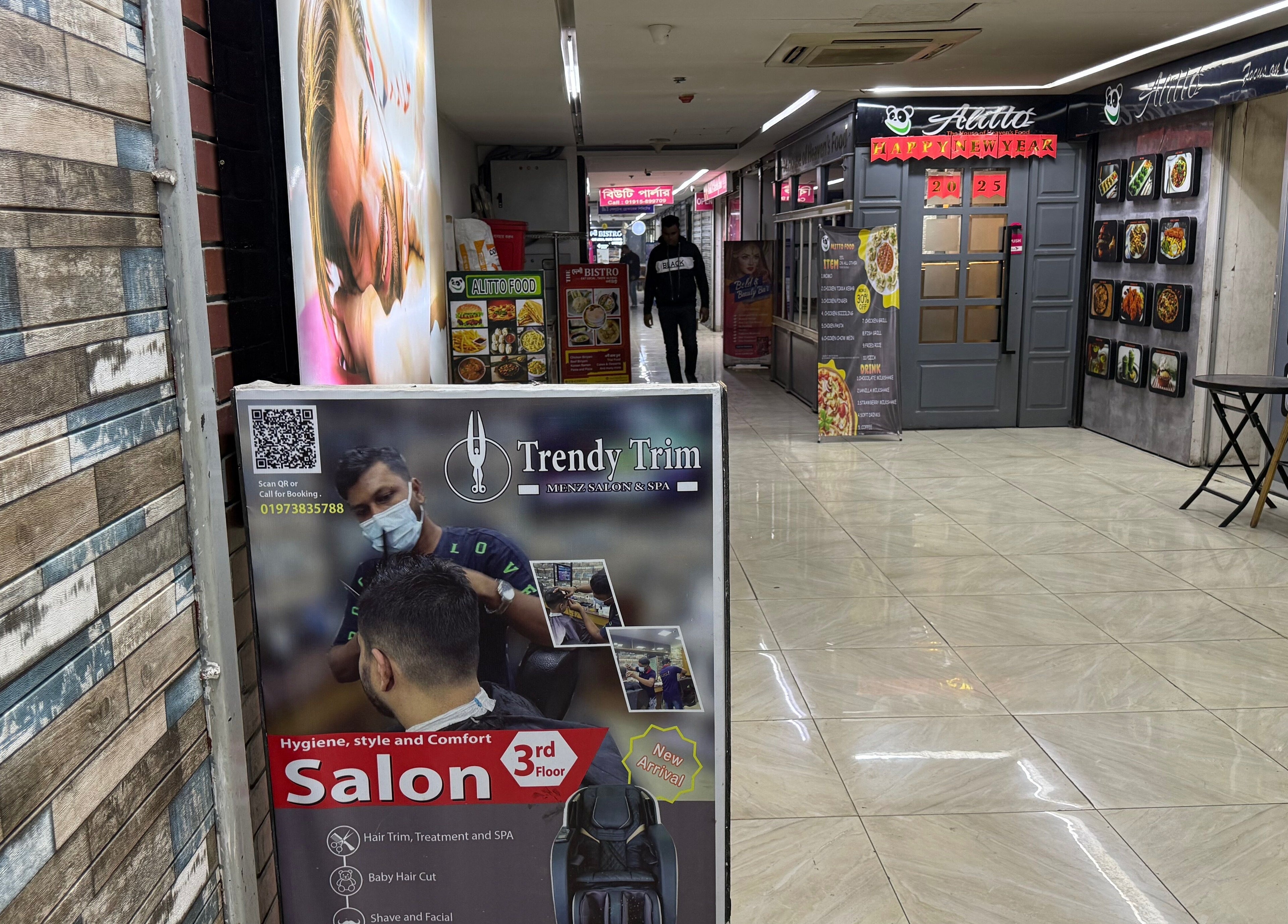 Trendy Trim salon signage at a busy corridor in Dhaka, Dhaka Division, BD highlighting hygiene and style.