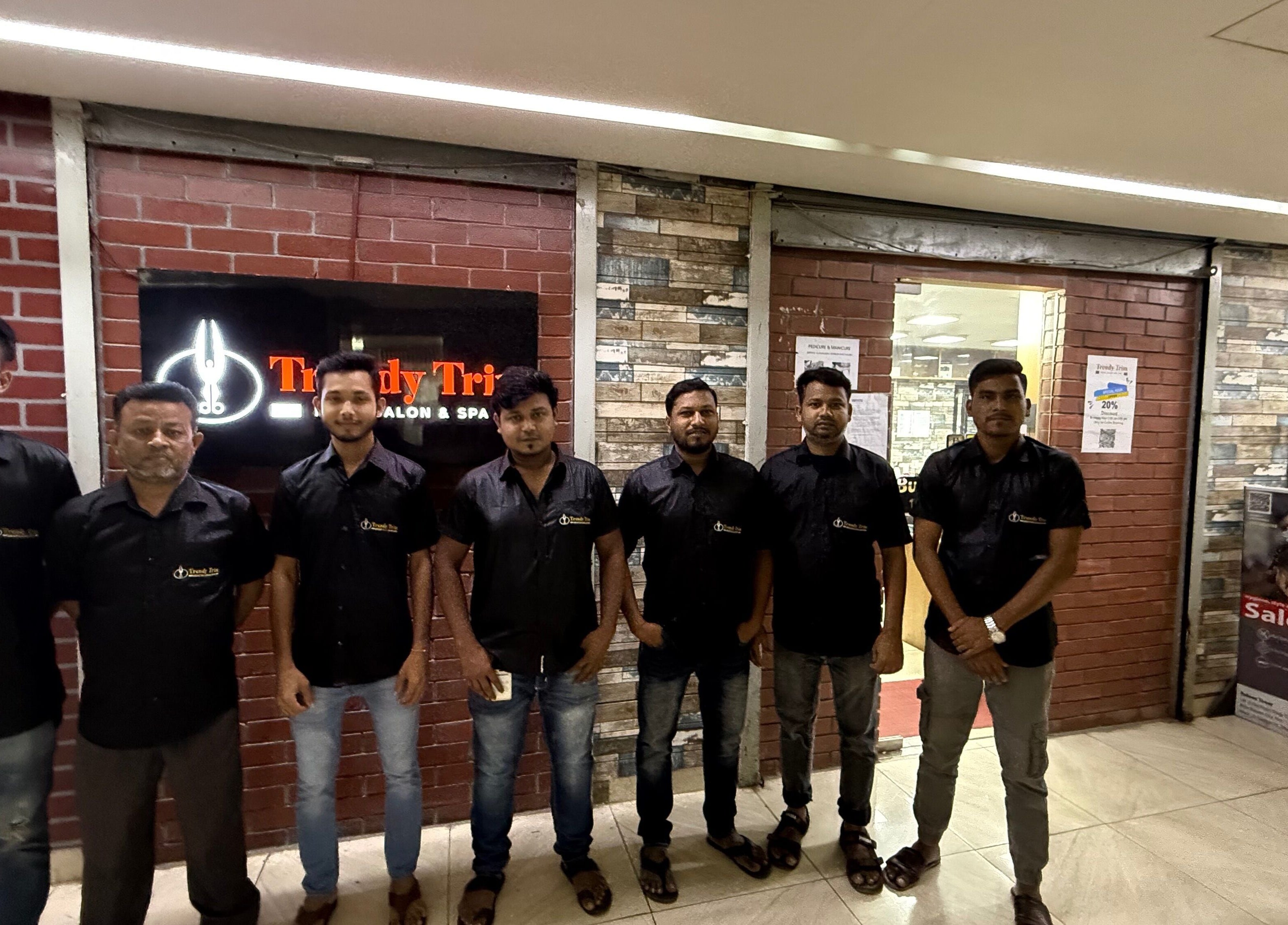 Team of Trendy Trim at Dhaka, Dhaka Division, BD, ready to welcome customers to the salon.