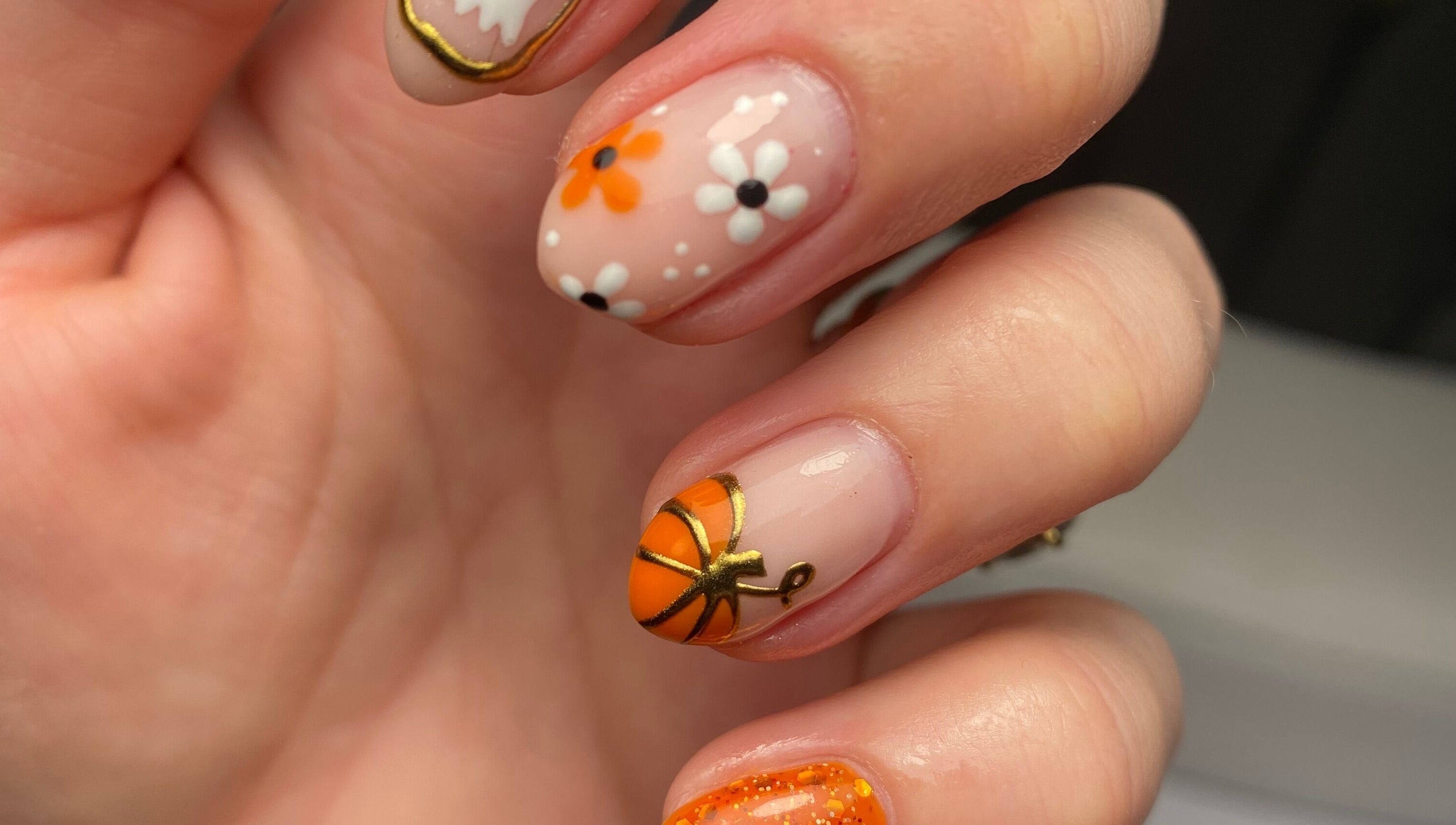Stylish floral nail art at No Filter aesthetics and beauty in Aylesbury, England, GB.