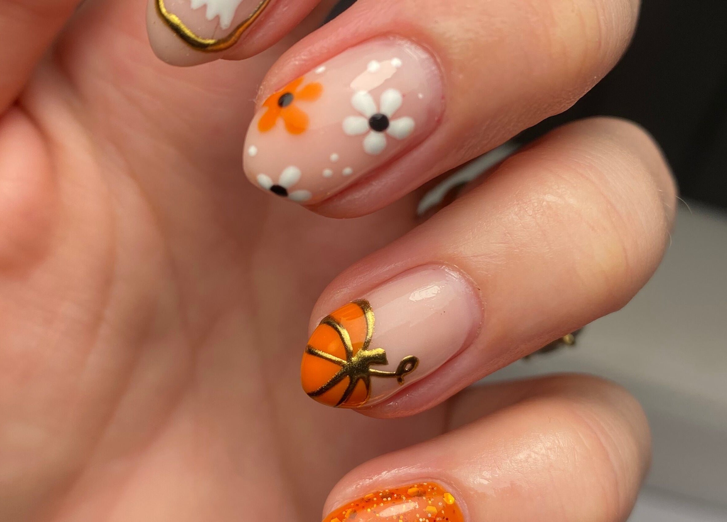 Stylish floral nail art at No Filter aesthetics and beauty in Aylesbury, England, GB.
