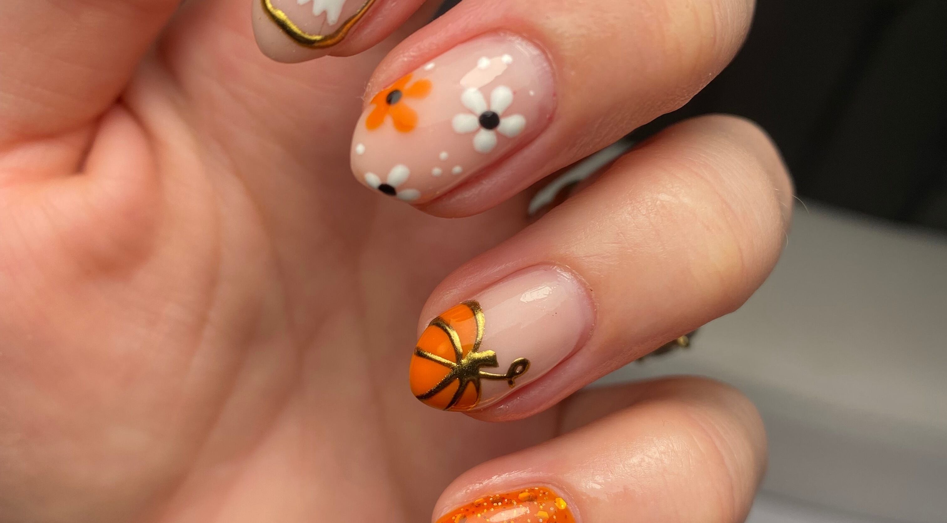 Stylish floral nail art at No Filter aesthetics and beauty in Aylesbury, England, GB.