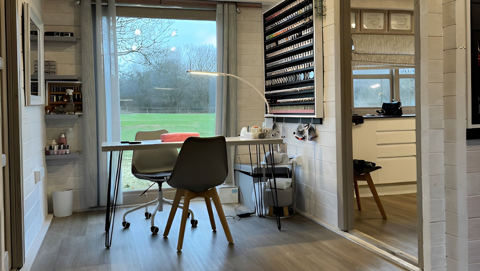 Stylish nail salon interior at NC Wellbeing, Meopham, England. Modern design with nature views.