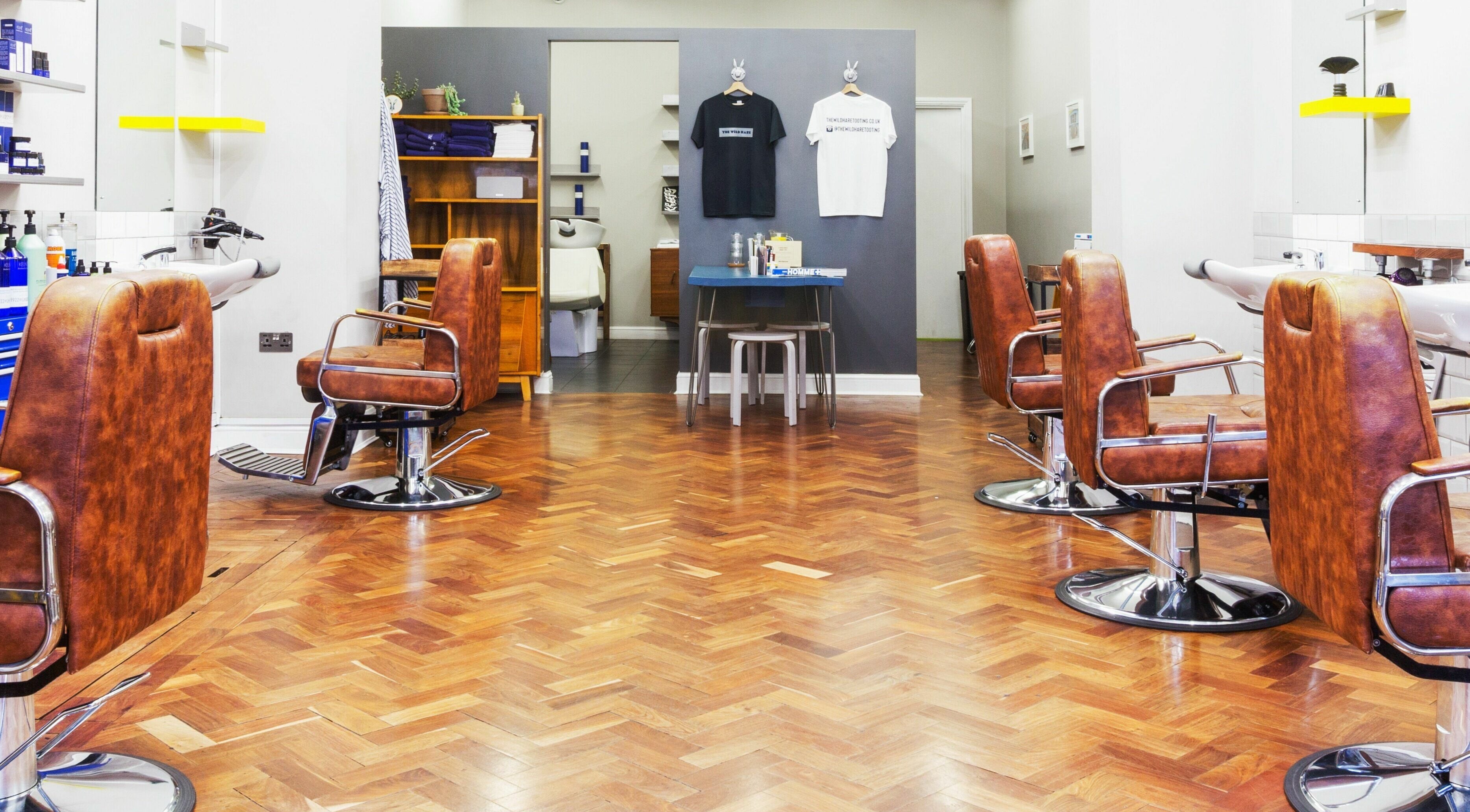 Elegant salon chairs at The Wild Hare in London, England, GB, showcasing a stylish and modern beauty venue.