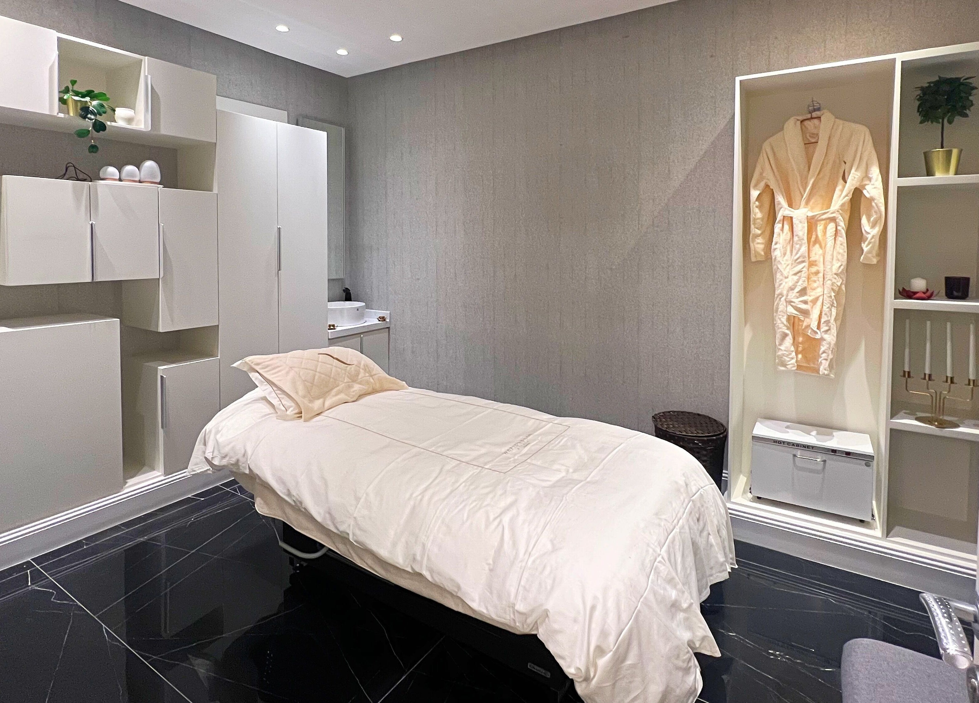 Luxurious spa room at Vogue Icon for Men, Riyadh, Riyadh Province, SA, featuring elegant decor and amenities.