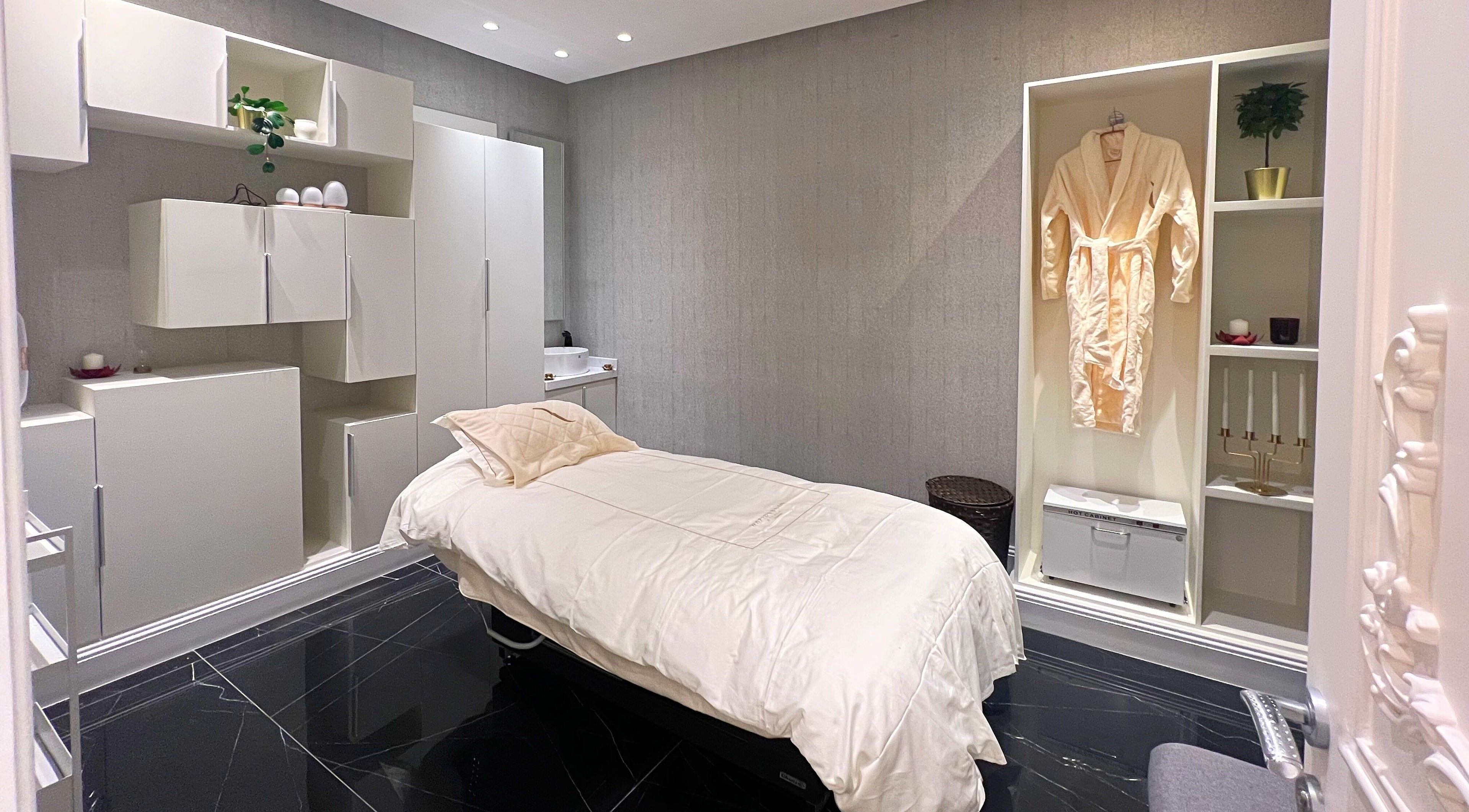 Luxurious spa room at Vogue Icon for Men, Riyadh, Riyadh Province, SA, featuring elegant decor and amenities.