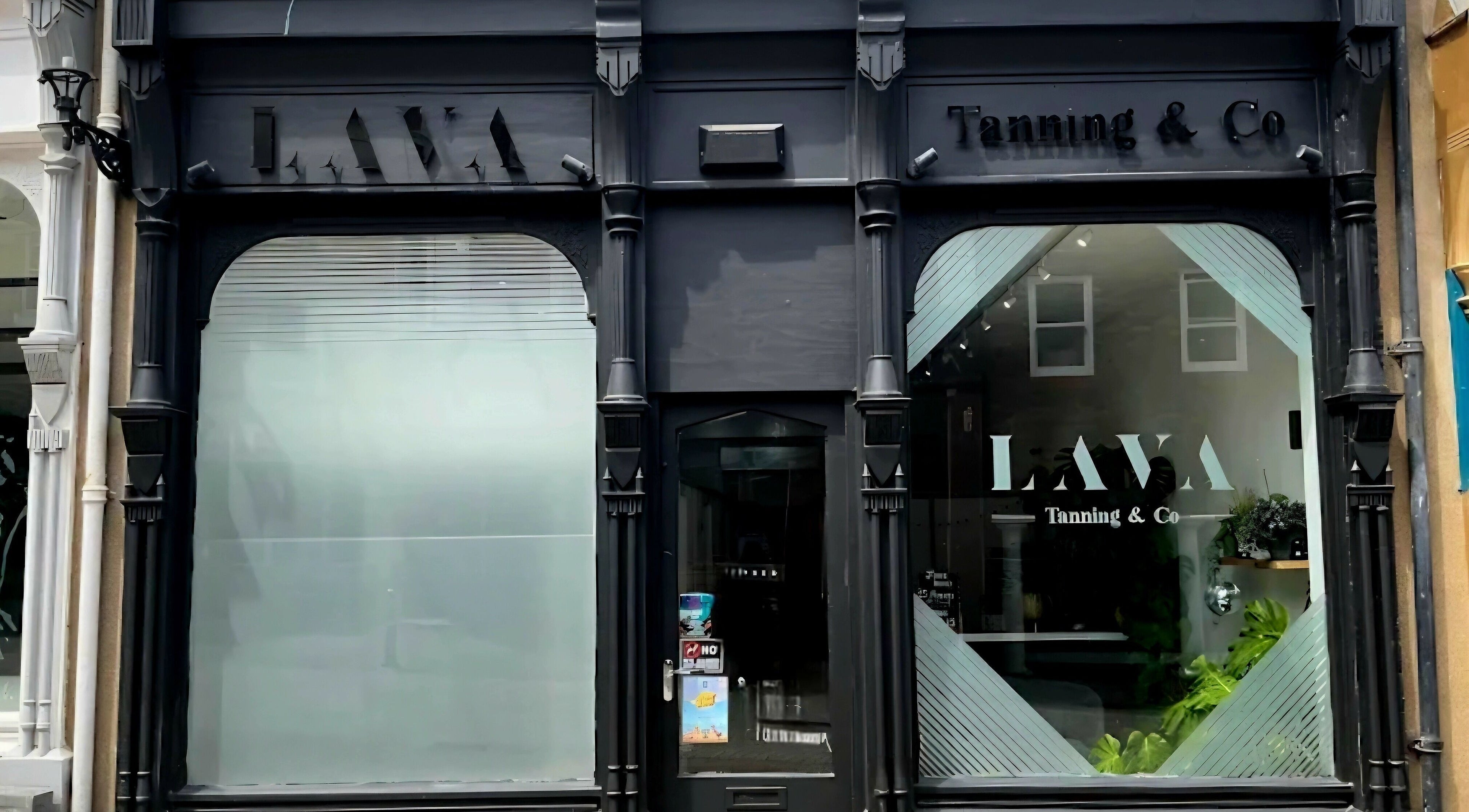 Elegant storefront of Nikita Connie Hair in Folkestone, England, GB with stylish black design.