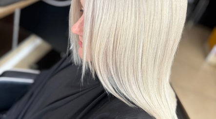 Expertly styled blonde hair at Laura Waterworth Hair, Dunmurry, Northern Ireland, GB.