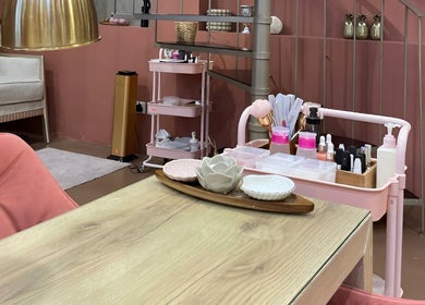 Elegant beauty setup at Madame Oh La Laa in Al Khobar, SA with stylish decor and nail care essentials.