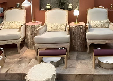 Elegant pedicure chairs at Madame Oh La Laa, Al Khobar, SA, offering a serene spa experience.