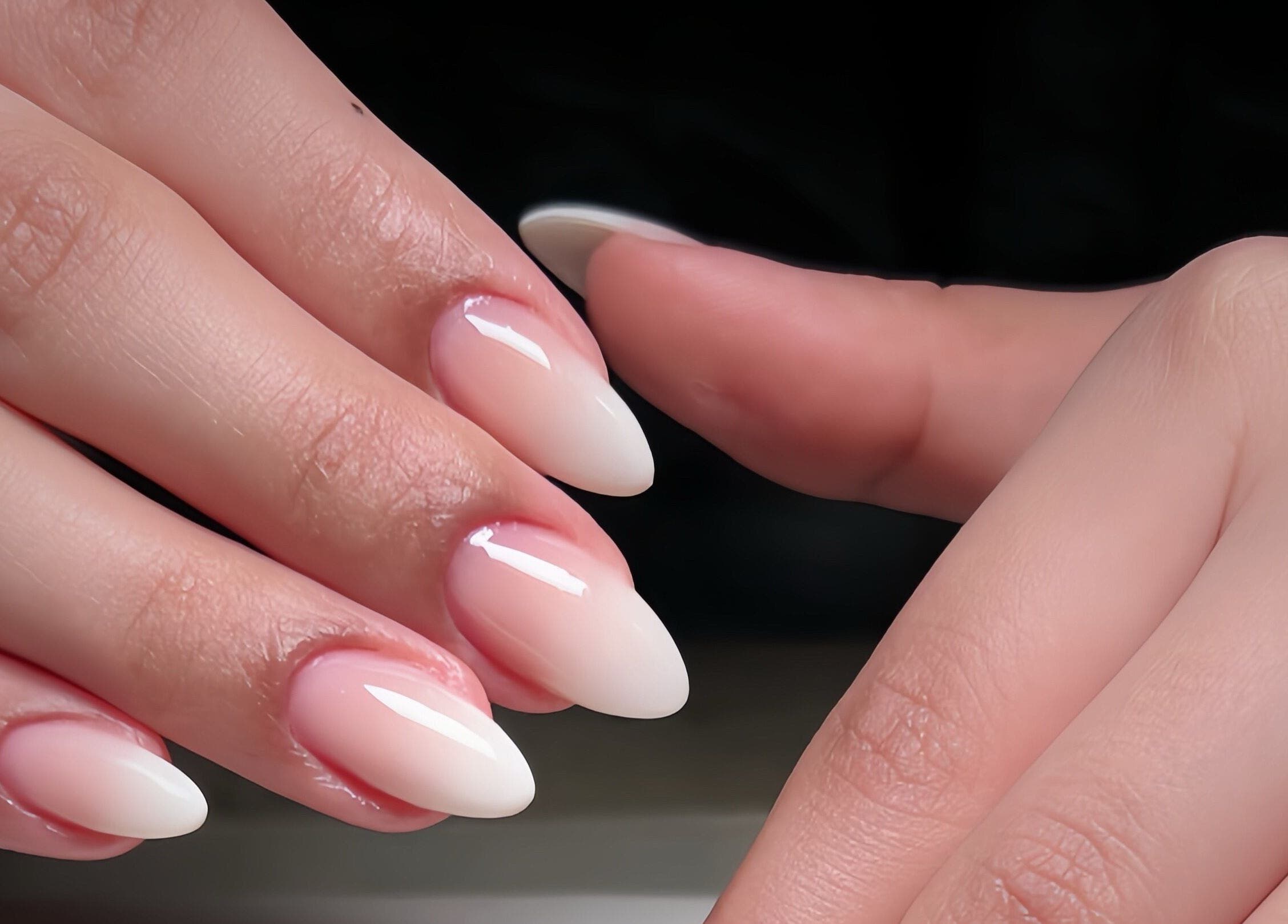 Elegant manicured nails at Madame Oh La Laa, Al Khobar, SA highlighting beauty and wellness expertise.