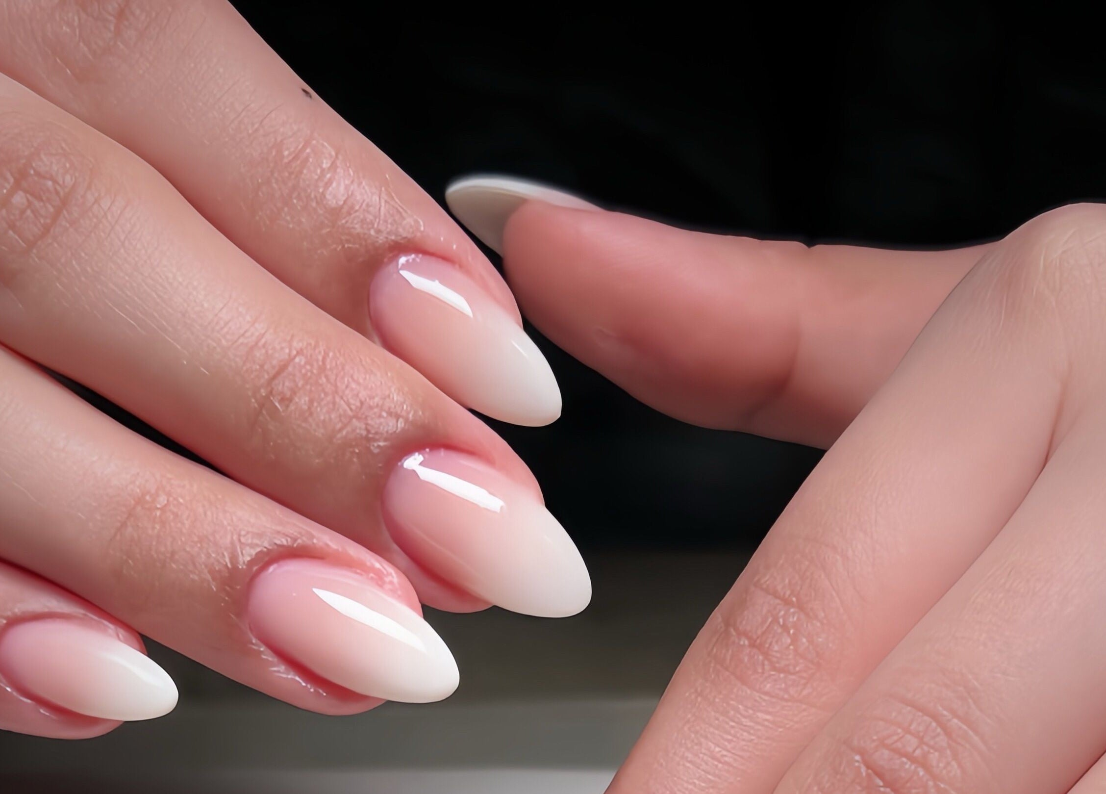 Elegant manicured nails at Madame Oh La Laa, Al Khobar, SA highlighting beauty and wellness expertise.