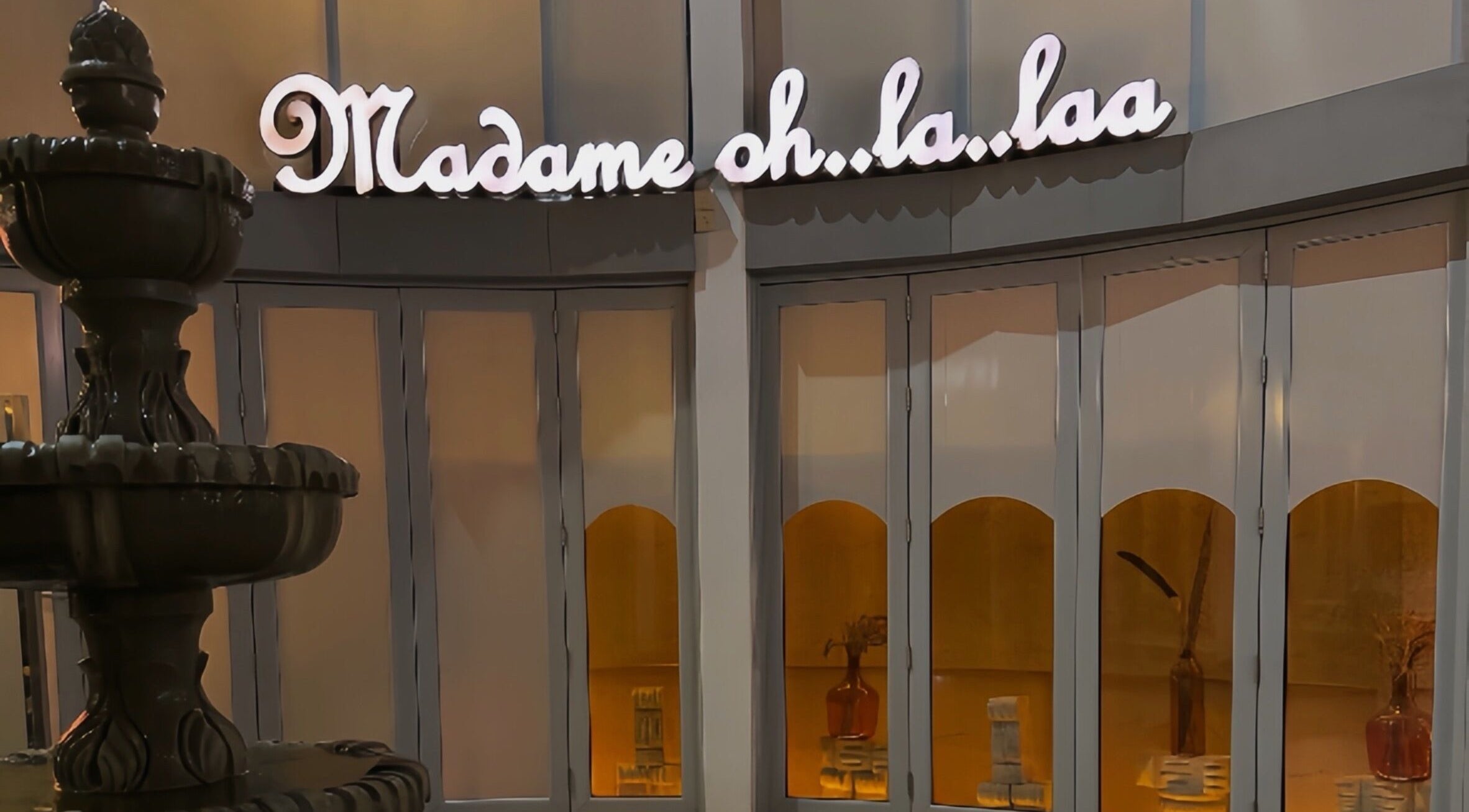 Entrance of Madame Oh La Laa, a beauty venue in Al Khobar, SA, with stylish decor.