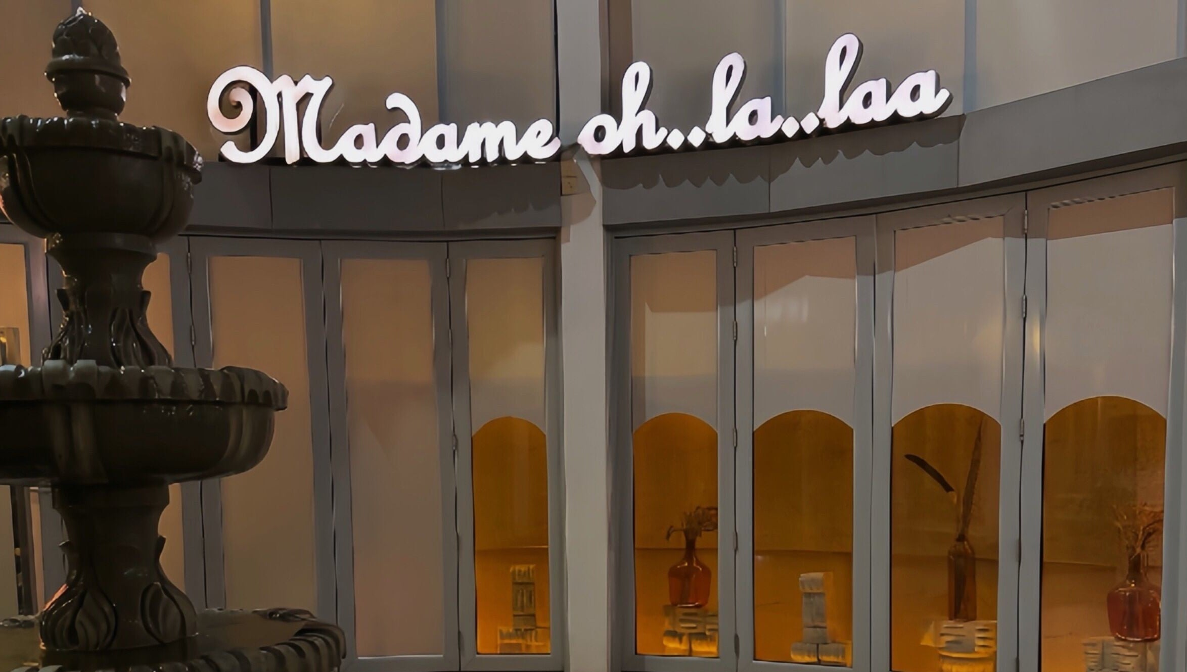Front view of Madame Oh La Laa with softly lit windows in Al Khobar, SA.