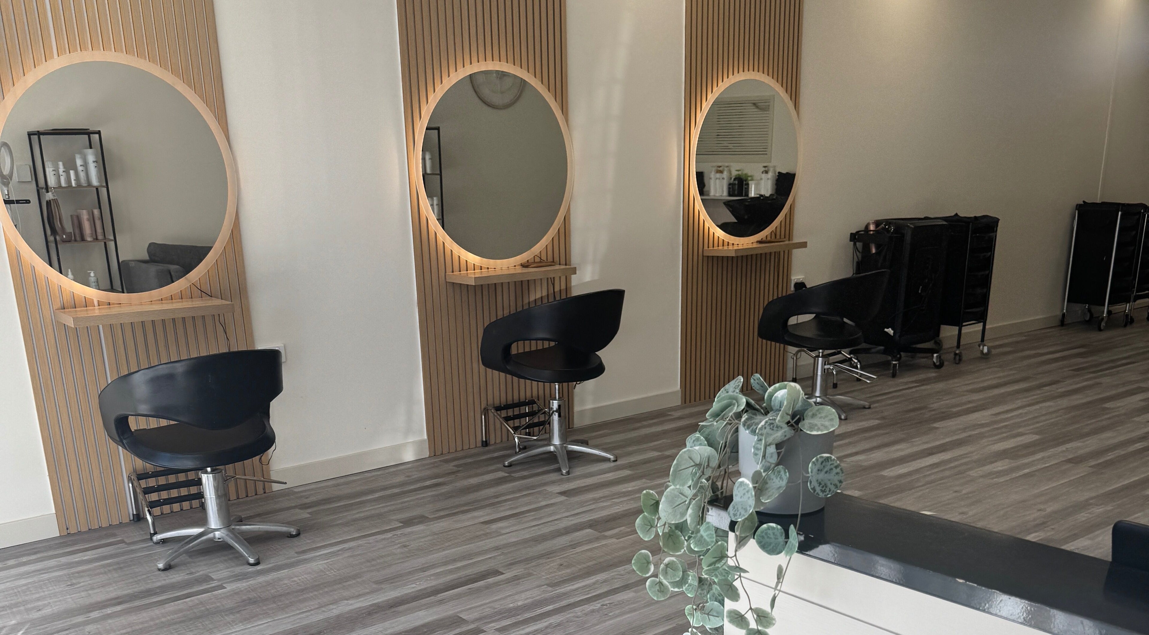 Modern styling chairs at Sarah Emily Hairstylist in Shailer Park, Queensland, AU.
