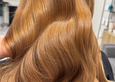 Luxurious golden hair styled at Sarah Emily Hairstylist in Shailer Park, Queensland, AU.