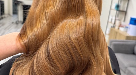 Luxurious golden hair styled at Sarah Emily Hairstylist in Shailer Park, Queensland, AU.