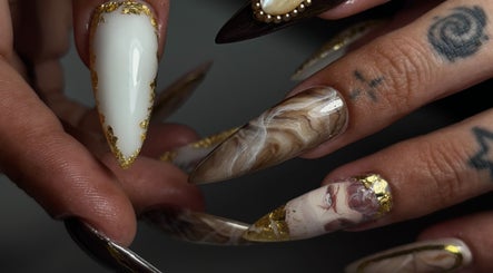 Elegant nail art with gold accents at Sterling Co., New Plymouth, Taranaki, NZ.