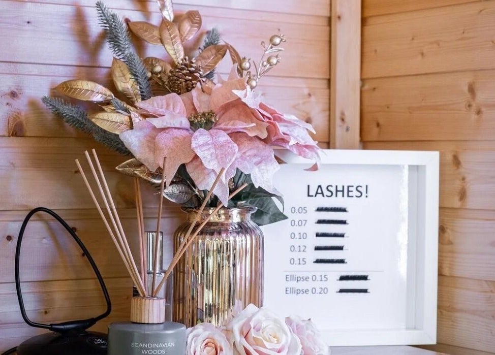 Elegant floral arrangement and lash chart at Lashes by Shareen, Kettering, England, GB.
