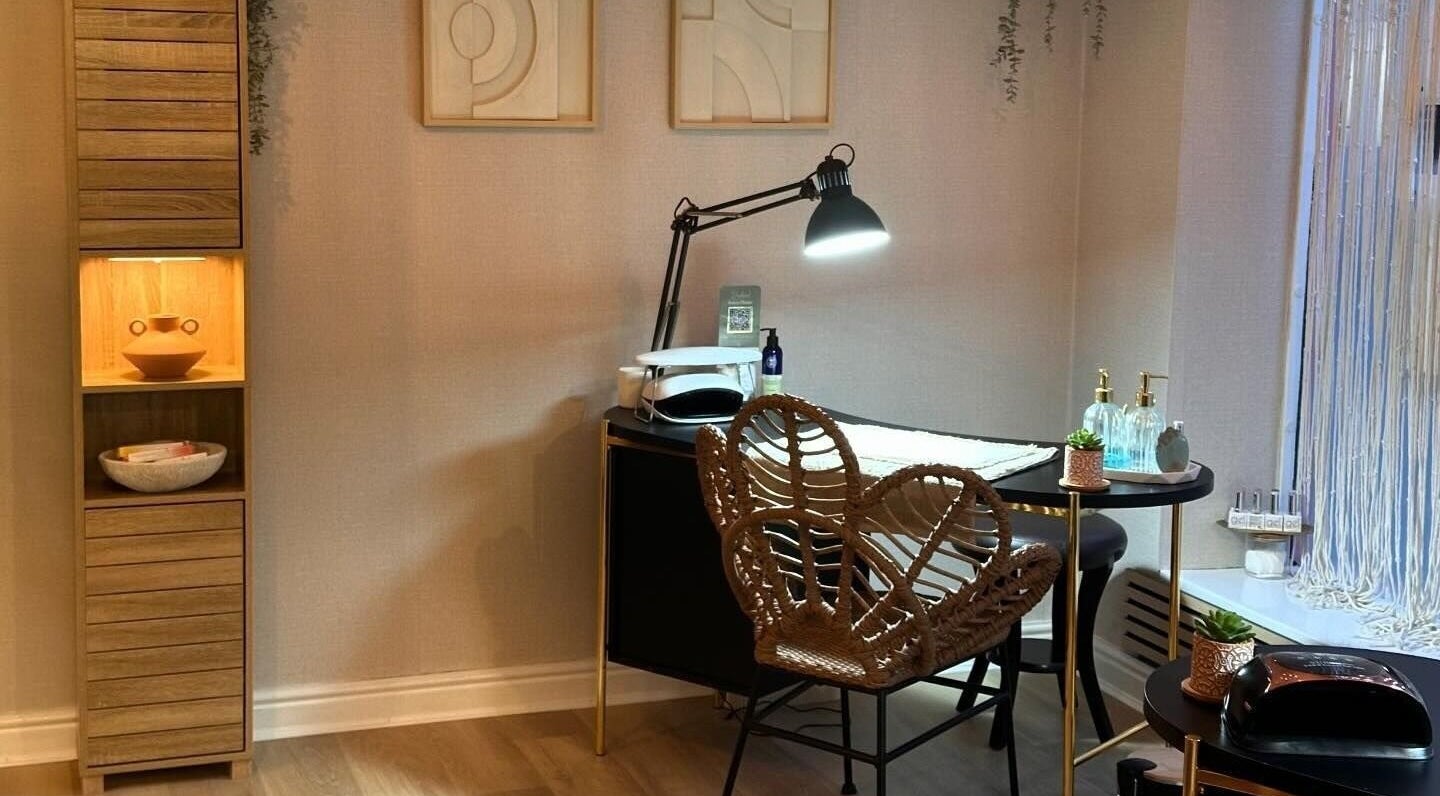 Cozy beauty corner at Beauty Clinique in Atherstone, England, GB featuring chic decor and a stylish work desk.