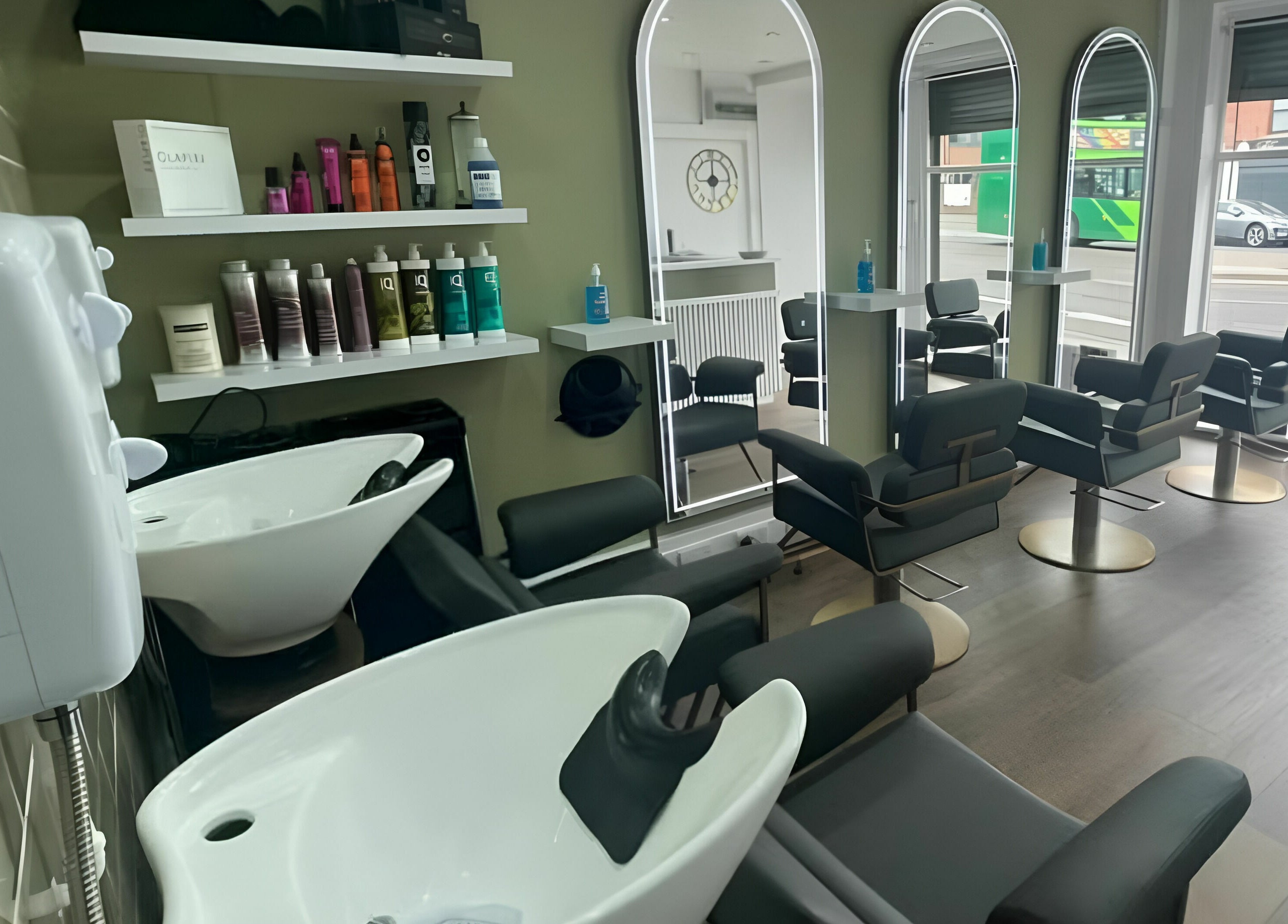 Verde Hair Salon in Leeds, England, GB showcasing stylish chairs and mirrors for a serene beauty experience.