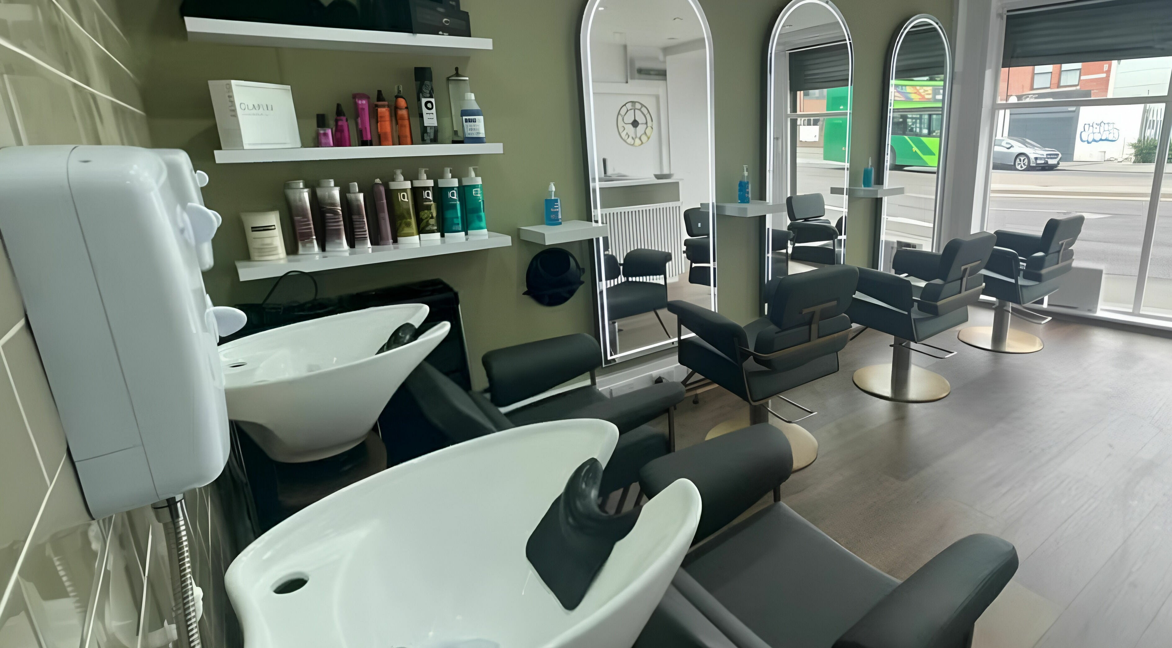 Verde Hair Salon in Leeds, England, GB showcasing stylish chairs and mirrors for a serene beauty experience.